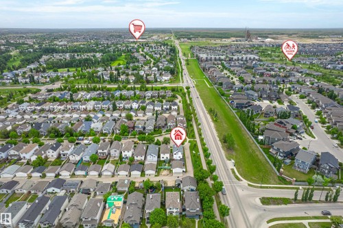 Aerial overview of a residential neighborhood with numerous single-family homes - 21384 88 Avenue, Edmonton, AB 