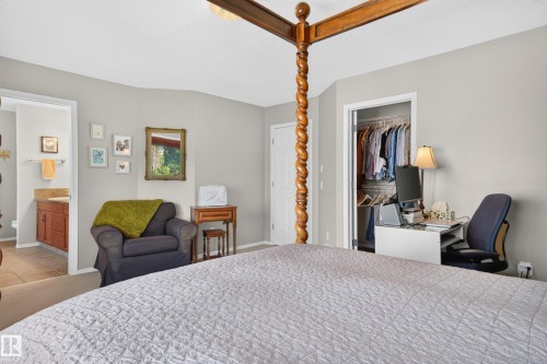 Room featuring light gray walls and a textured ceiling - 1310 82 Street, Edmonton, AB 