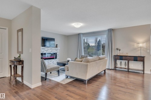 173 Reichert, Beaumont, AB - Indoor Photo Showing Living Room With Fireplace
