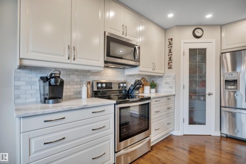 173 Reichert, Beaumont, AB - Indoor Photo Showing Kitchen With Stainless Steel Kitchen With Upgraded Kitchen