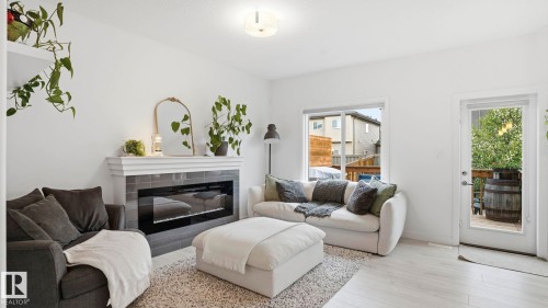 7215 Chivers Place, Edmonton, AB - Indoor Photo Showing Living Room With Fireplace