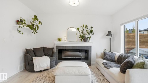 7215 Chivers Place, Edmonton, AB - Indoor Photo Showing Living Room With Fireplace