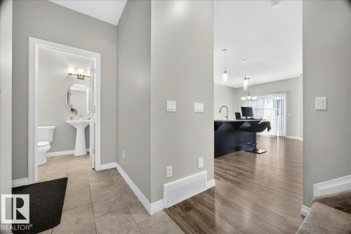 Welcoming entryway featuring tile flooring and a neutral color palette - 17203 71 Street, Edmonton, AB 