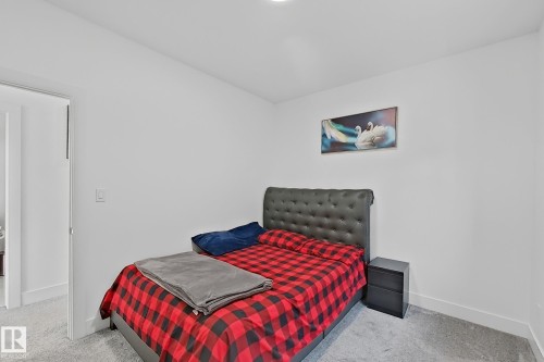 Wall-to-wall carpeting and white painted walls - 415 42 Street, Edmonton, AB 