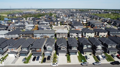 Contemporary residential neighborhood featuring detached and attached homes - 415 42 Street, Edmonton, AB 