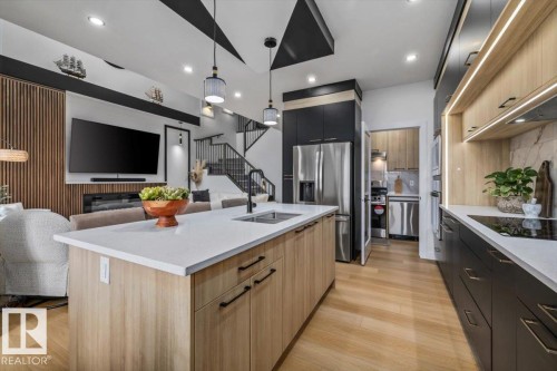 3616 Triomphe Boulevard, Beaumont, AB - Indoor Photo Showing Kitchen With Double Sink With Upgraded Kitchen