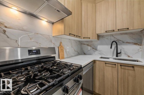 3616 Triomphe Boulevard, Beaumont, AB - Indoor Photo Showing Kitchen With Double Sink