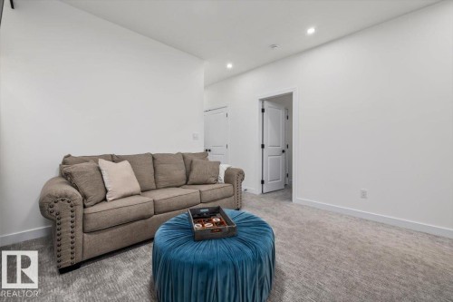 3616 Triomphe Boulevard, Beaumont, AB - Indoor Photo Showing Living Room