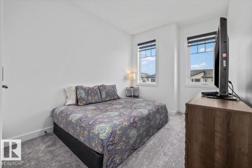 3616 Triomphe Boulevard, Beaumont, AB - Indoor Photo Showing Bedroom