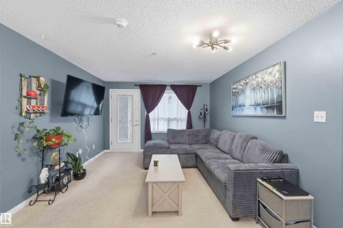 Living room - 128 1520 Hammond Gate, Edmonton, AB 