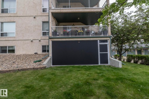 Building exterior with stucco finish and a multi-level design - 111 182 Haddow Close, Edmonton, AB 