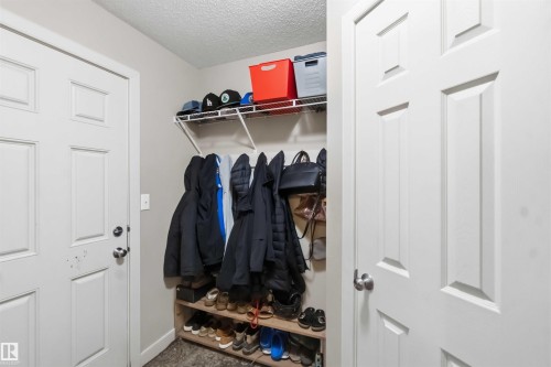 Entryway featuring two paneled doors with chrome hardware - 20013 131 Avenue, Edmonton, AB 