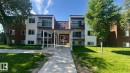 Three-story apartment building featuring brick and vertical siding - 203 11445 41 Avenue, Edmonton, AB 