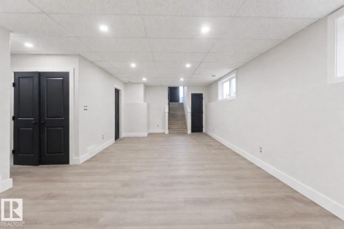Spacious room featuring light wood-finish flooring and bright white walls - 301 Fundy Way, Cold Lake, AB - Indoor