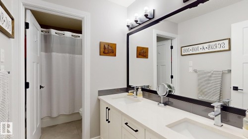 Dual vanity with integrated sinks and quartz countertops - 312 West Haven Drive, Leduc, AB 