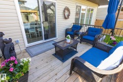 Wood-finish deck with a sliding glass door entry to the interior - 