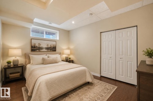Basement bedroom virtually staged. - 32 Harrington Bay, Spruce Grove, AB 