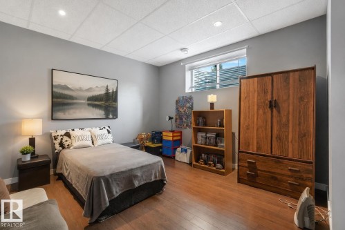 Basement bedroom virtually enhanced decor. - 32 Harrington Bay, Spruce Grove, AB 