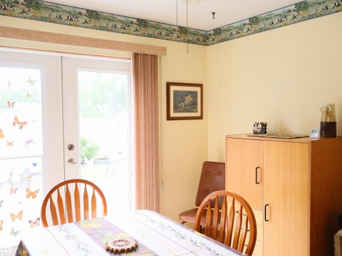 Double French doors with vertical blinds - 58403 Rr 60, Rural Barrhead County, AB - Indoor Photo Showing Dining Room