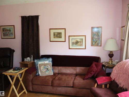 Room featuring light pink wall color and wood-finish flooring - 58403 Rr 60, Rural Barrhead County, AB - Indoor
