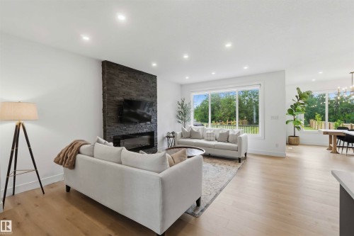 Welcome to 1527 Esaiw Place NW - 1527 Esaiw Place Nw, Edmonton, AB - Indoor Photo Showing Living Room With Fireplace