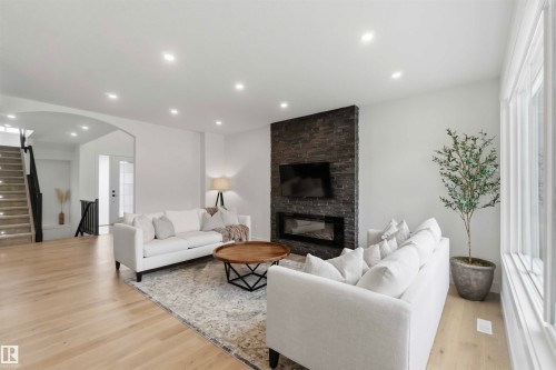 Welcome to 1527 Esaiw Place NW - 1527 Esaiw Place Nw, Edmonton, AB - Indoor Photo Showing Living Room With Fireplace