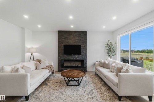Welcome to 1527 Esaiw Place NW - 1527 Esaiw Place Nw, Edmonton, AB - Indoor Photo Showing Living Room With Fireplace