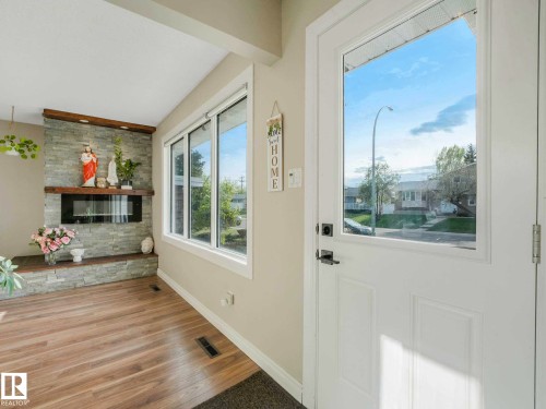 White front door with an integrated window - 9207 169 Street, Edmonton, AB - Indoor Photo Showing Other Room