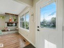 White front door with an integrated window - 9207 169 Street, Edmonton, AB  - Indoor Photo Showing Other Room 