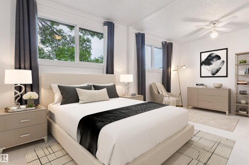 Virtually staged primary bedroom [easy to convert back to 2 bedroom] - 1131 Hooke Road, Edmonton, AB 