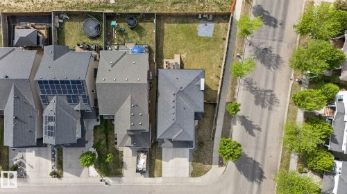 Aerial view showcasing multiple residential properties with gray shingle roofs - 9628 221 Street, Edmonton, AB 