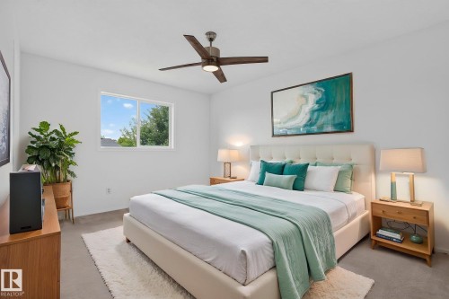 White walls and a neutral carpet provide a bright ambiance - 6225 159A Avenue, Edmonton, AB 