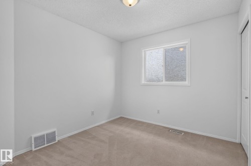 Neutral-toned wall paint and carpeting throughout - 6225 159A Avenue, Edmonton, AB 