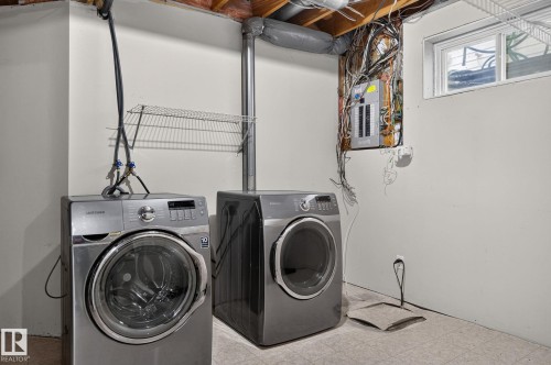 Dedicated laundry area with exposed utility plumbing - 6225 159A Avenue, Edmonton, AB 