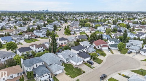 Expansive residential community featuring a variety of architectural styles, mature landscaping, and curved streets - 6225 159A Avenue, Edmonton, AB 