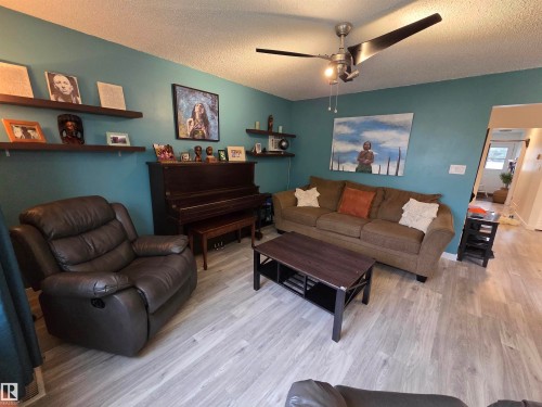 Living area with wood-finish flooring - 2514 149 Avenue, Edmonton, AB 