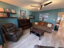 Living area with wood-finish flooring - 2514 149 Avenue, Edmonton, AB 