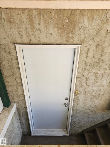 Basement Entry is Boarded up for Security - Edmonton, AB 