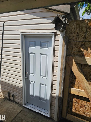 Garage Door is Boarded up for Security - Edmonton, AB 