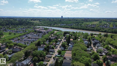 Aerial perspective of a residential neighborhood featuring established homes with varying rooflines - 10173 93 Street, Edmonton, AB 