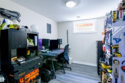 Finished room featuring wood-finish flooring and a single window - 