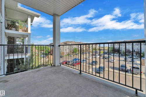 Concrete balcony with black metal railings - 3302 9351 Simpson Drive, Edmonton, AB 