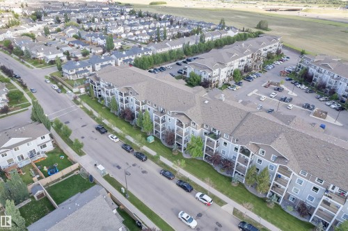 Multi-story residential buildings featuring private balconies and gabled roofs - 3302 9351 Simpson Drive, Edmonton, AB 