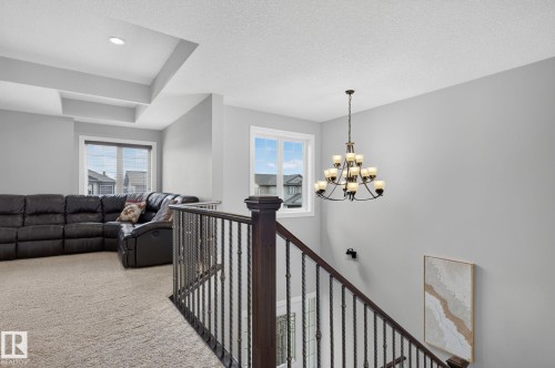 Upper-level bonus room with recessed lighting and a tray ceiling - 14016 161 Avenue, Edmonton, AB 