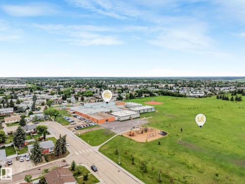 Aerial view of nearby Overlanders School and park featuring a baseball pitch, soccer field and jungle gym. Also nearby is the Edmonton East Soccer Dome. - 2921 130 Avenue, Edmonton, AB 