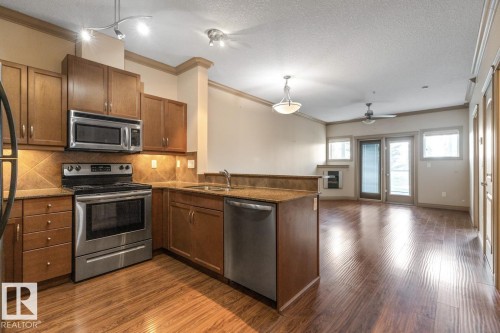 241 10121 80 Avenue, Edmonton, AB - Indoor Photo Showing Kitchen With Double Sink