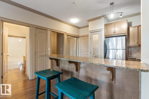 241 10121 80 Avenue, Edmonton, AB - Indoor Photo Showing Kitchen With Upgraded Kitchen