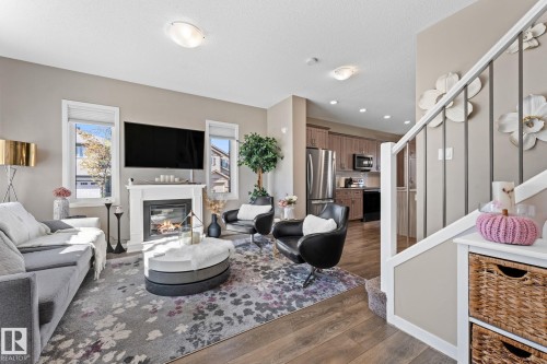 17159 49 Street, Edmonton, AB - Indoor Photo Showing Living Room With Fireplace