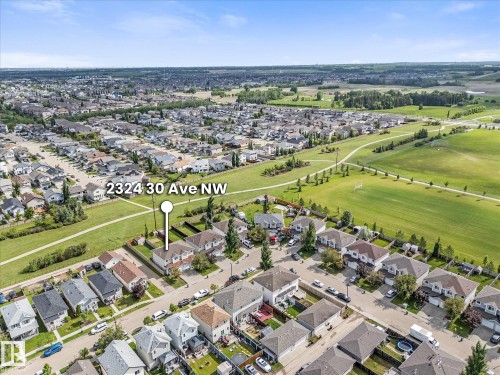 Aerial perspective showcasing a residential neighborhood with varied housing styles - 2324 30 Avenue, Edmonton, AB 
