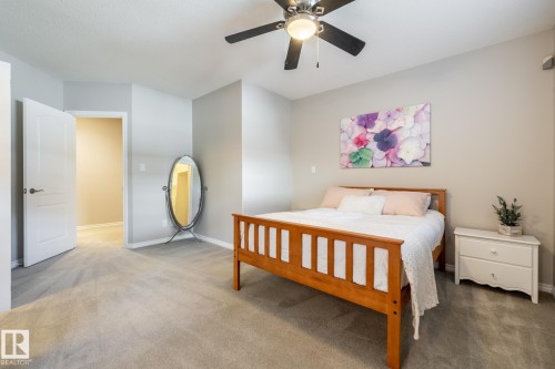 Neutral-toned wall paint and light gray carpeting - 315 Osland Place, Edmonton, AB 